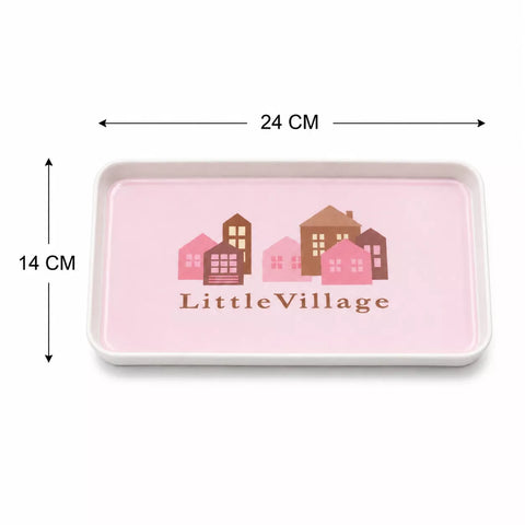 A rectangular pink tray with rounded corners and a printed 'LittleVillage' house illustration, shown with dimension arrows indicating 24 cm width and 14 cm height on a white background.