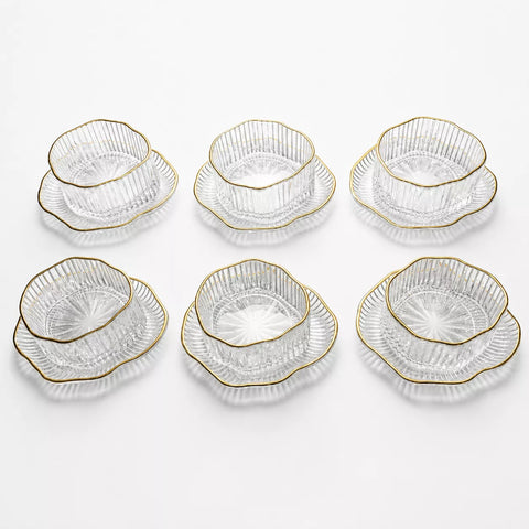 Six pairs of clear cut-glass bowls with scalloped edges and gold trim, arranged in two rows of three on a white background.