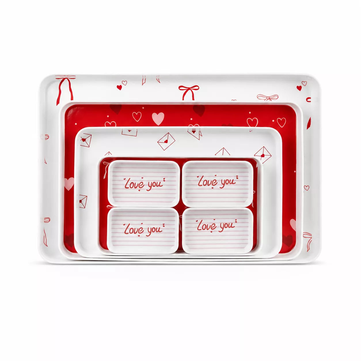 A set of nested rectangular trays with a Valentine's Day theme. The outer tray is white with red hearts and bows, the middle tray is solid red, and the inner trays are white with red hearts and the words 'Love you' printed in red script.