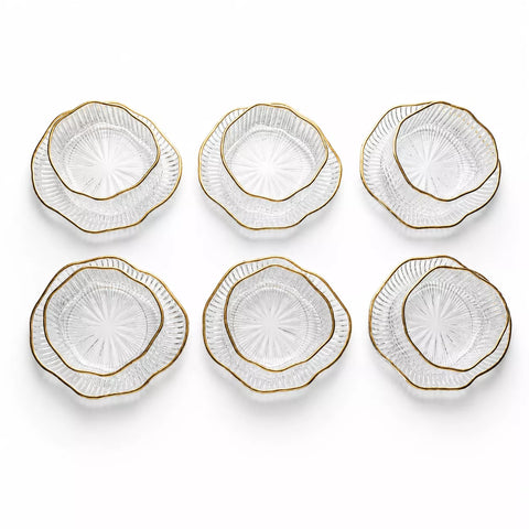 Six clear glass bowls with scalloped edges and a thin gold rim, arranged in two rows of three on a white background.