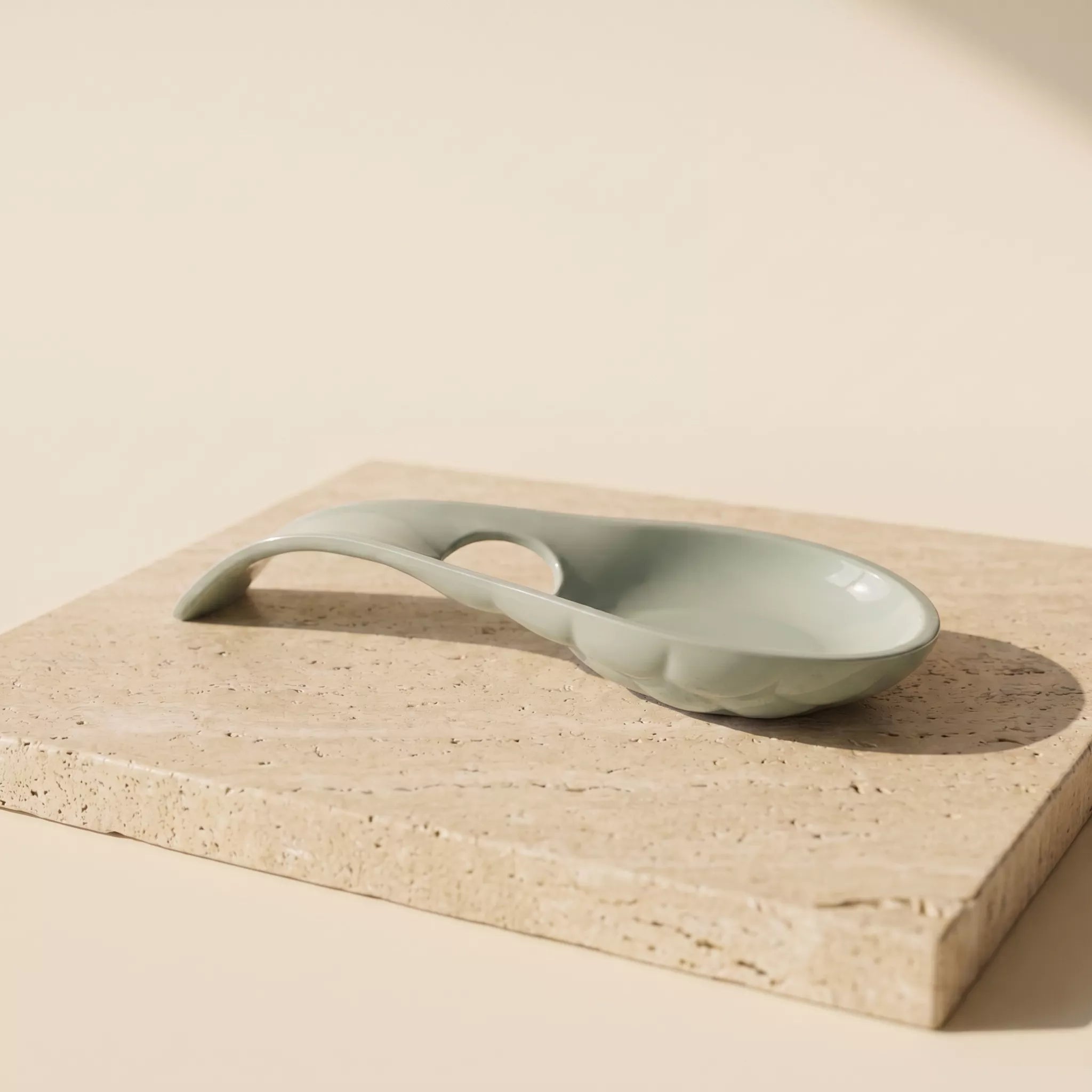 Side view of ceramic spoon rest