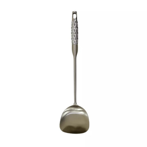 Metallic ladle with decorative handle on a white background